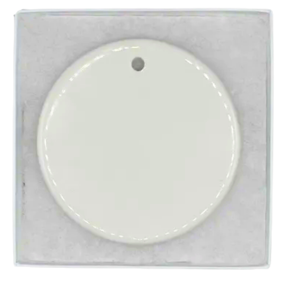 Ornamento de cerámica circular en caja blanca